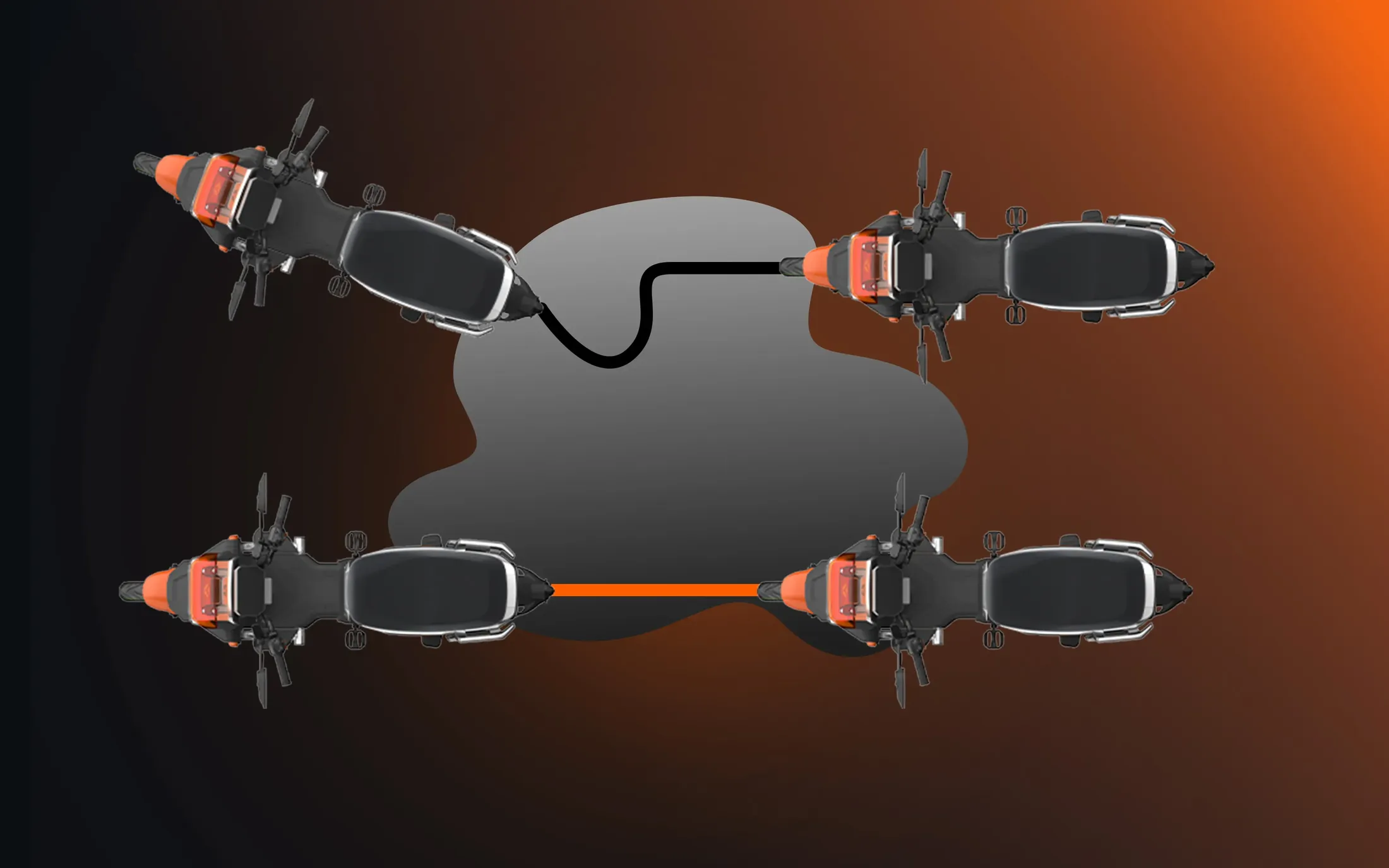 Vue du dessus de quatre GFX6 aux rétroviseurs orange, reliés par un câble